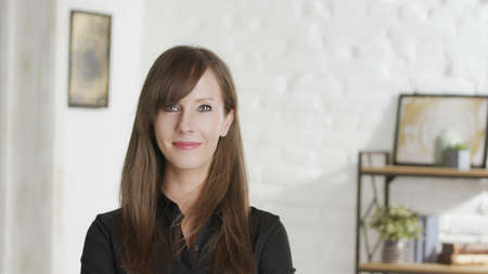 Portrait of confident woman at homeの写真素材