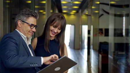 Business people working with tablet in officeの写真素材