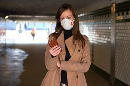 Coronavirus disease - woman wearing face maskの写真素材