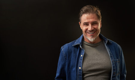 Portrait of happy mid adult man with confident smile