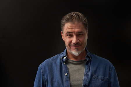 Portrait of happy mid adult man with confident smile