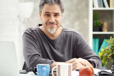 Portrait of smiling man at home,の写真素材