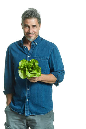 Man holding green salad - healthy eatingの写真素材