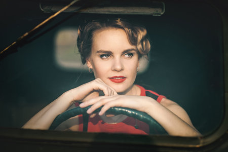 Woman in retro carの写真素材