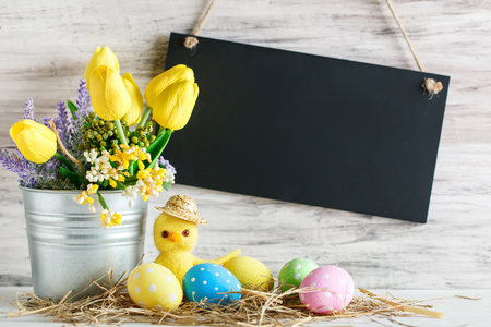 Happy Easter. Congratulatory easter background. Easter eggs and chick.の写真素材