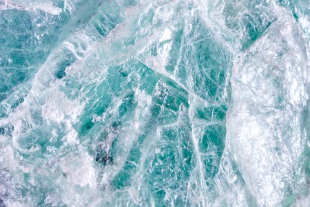 Macro shooting of natural gemstone. The raw mineral is talc.の写真素材