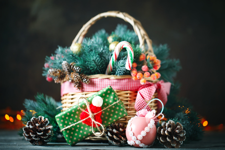 Basket with Christmas toys and Christmas giftsの写真素材