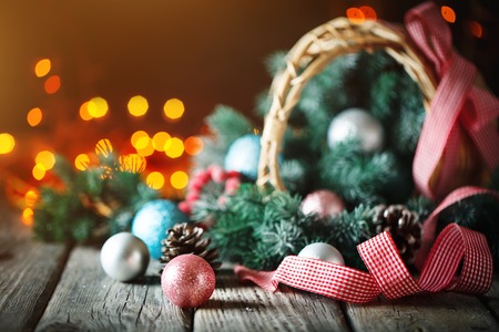 Christmas gift and Christmas tree on dark woodenの写真素材