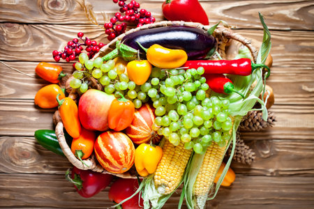 The table, decorated with vegetables and fruits. Harvest Festival. Happy Thanksgiving. Autumn...