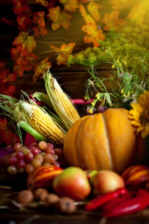 The table, decorated with vegetables and fruits. Harvest Festival.の写真素材