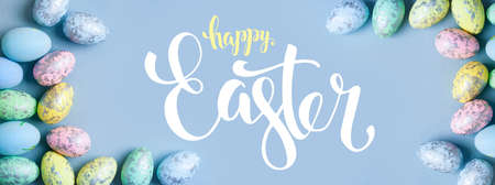 Happy Easter. Congratulatory easter background. Selective focus. Banner. Flat lay. Horizontal.の写真素材