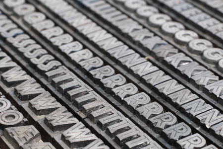 Old metal letterpress printing blocksの写真素材