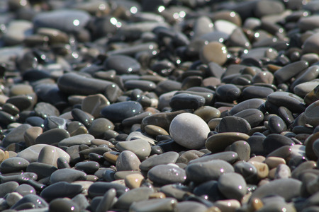 Soft wave on pebble beachの写真素材