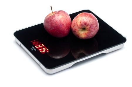 apples on scaleの写真素材