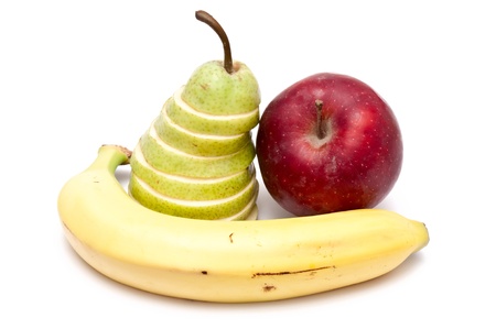 sliced green pear, red apple and a bananaの写真素材
