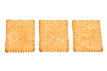 some butter biscuits over a white backgroundの写真素材