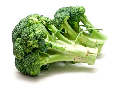 some green broccoli over a white background