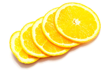 some lemon slices over a white backgroundの写真素材