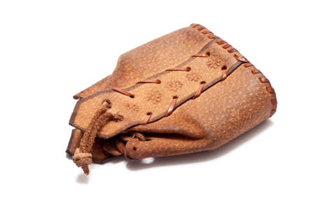 a little leather bag over a white backgroundの写真素材