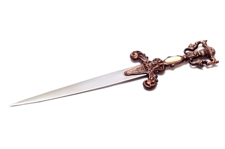 a single old dagger over a white background