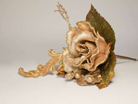 Artificial silk christmas gold rose flowerの写真素材