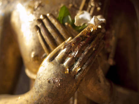 Buddha Image cross hands as a symbol of peaceful heartの写真素材
