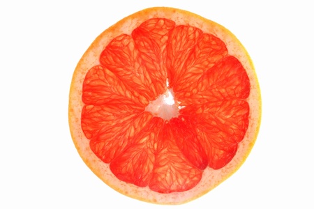 Grapefruit slice close up isolated on white backgroundの写真素材