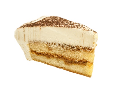 Slice of tiramisu close up isolated on white backgroundの写真素材