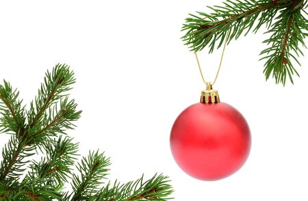 Christmas tree branches and decoration isolated on whiteの写真素材