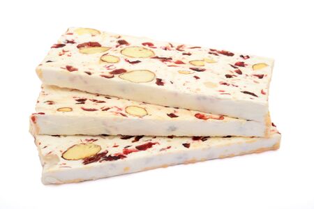 nougat slices close up on white backgroundの写真素材