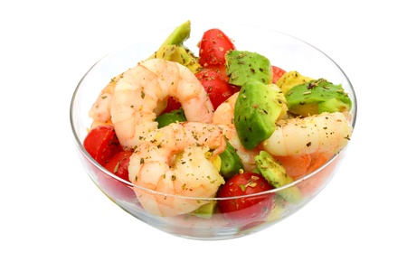 King prawns, avocado, tomato and herbs salad isolated on white backgroundの写真素材