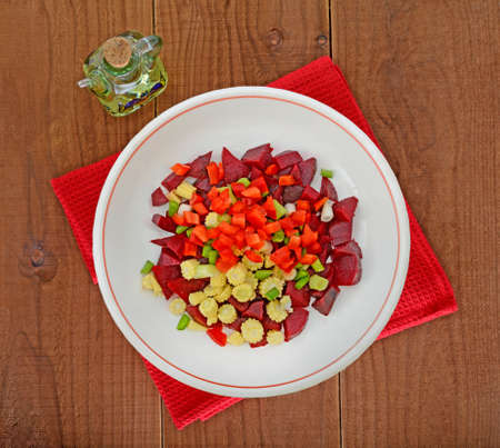 Beetroot salad with olive oil on wooden tableの写真素材