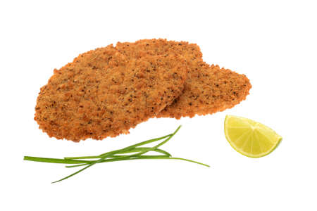 Turkey escalopes with chives herb and lime isolated on white