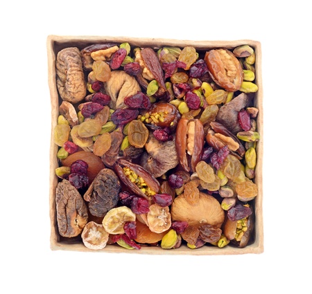 dry fruit and nuts in ceramic tray isolated on white backgroundの写真素材