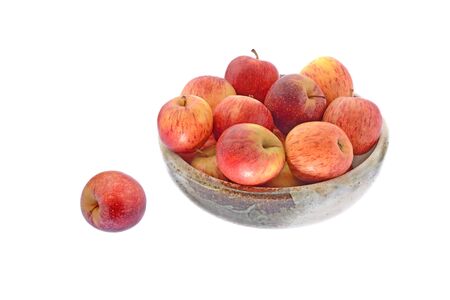 Apples in vase isolated on white backgroundの写真素材