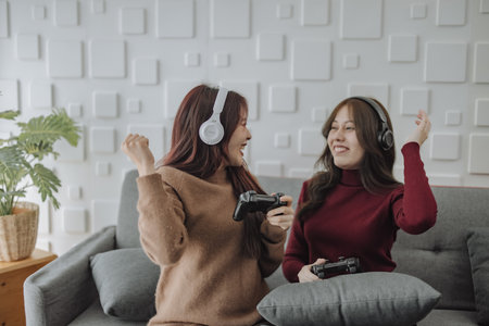Couples play games together with a lot of joy, enthusiasm and concentration, taking turns to win and lose. A funny and exciting time. learning how to solve problems, think critically, and be creativeの写真素材