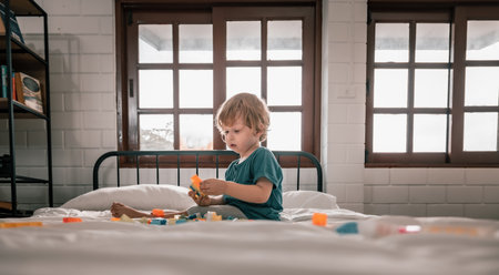 Apart from being fun educational toys and building blocks help kid develop brain, improve hand eye coordination, enhance fine motor skills, boost concentration, creativity and problem solving skillsの写真素材