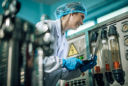 Drinking Water Quality Officer performs effective assessment, monitoring reverse osmosis systems to maintain high standards, efficiency, safety, while controlling contamination through expert testingの写真素材