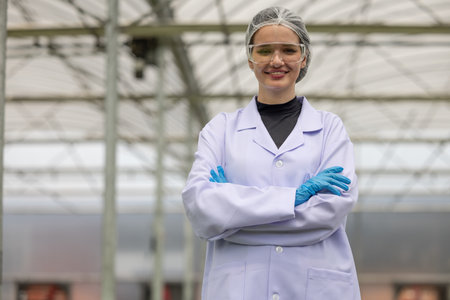 Hydroponic scientists and researchers do experiment using microscopes and magnifying glasses to...