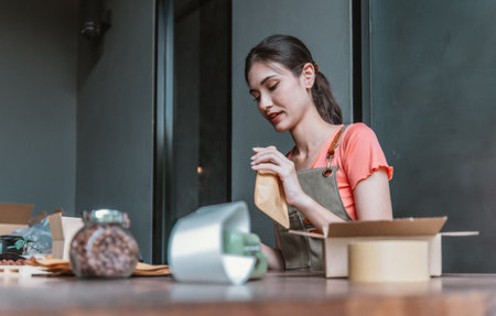 A small cafe owner promotes the sustainable circular economy, picking, wrapping, labeling coffee...