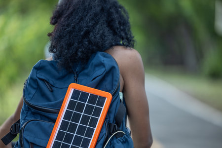 Female cyclist combine eco-consciousness with active lifestyle, using bikes for workout and travel,...
