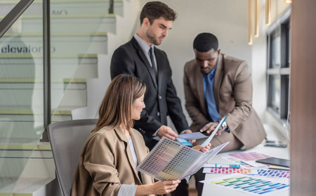 Product manager, designer, developer collaborate on UI, color, and interactive buttons of mobile app. Testing, optimizing prototype for best user experience, ensuring a seamless customer journey.の写真素材