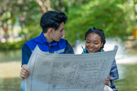 Mechanical engineers analyze blueprint, design paddlewheel aerator mechanism, motor, for efficient...