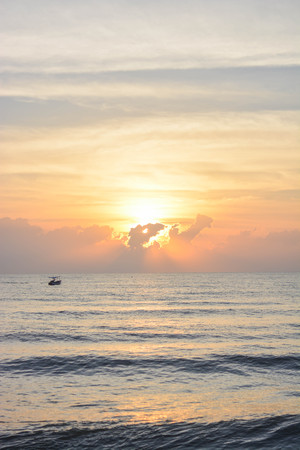 Sunrise on the beach at Hua-Hin, Thailand.の写真素材