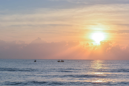 Sunrise on the beach at Hua-Hin, Thailand.の写真素材