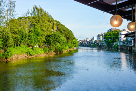 A thai wooden houses beside a river in Chanthaburi Thailand.の写真素材