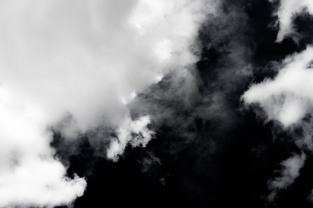 White - Grey smoke isolated on black background.の写真素材