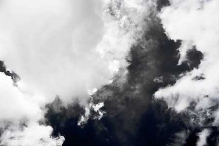 White - Grey smoke isolated on black background.の写真素材