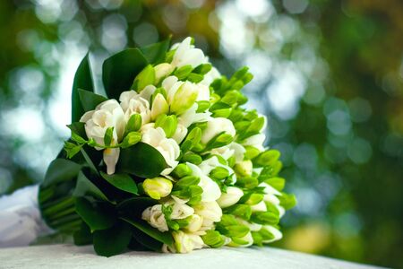 Wedding bouquet of freesias on a natural backgroundの写真素材