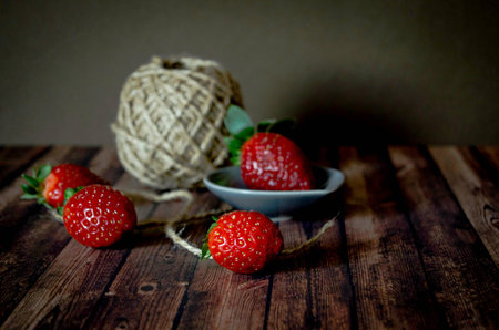 Strawberries on wooden backgroundの写真素材